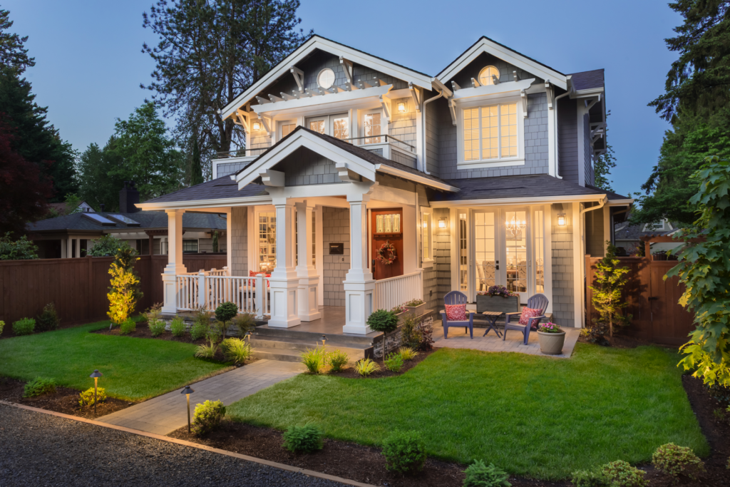 Outside view of a residential house that has all lights working properly.