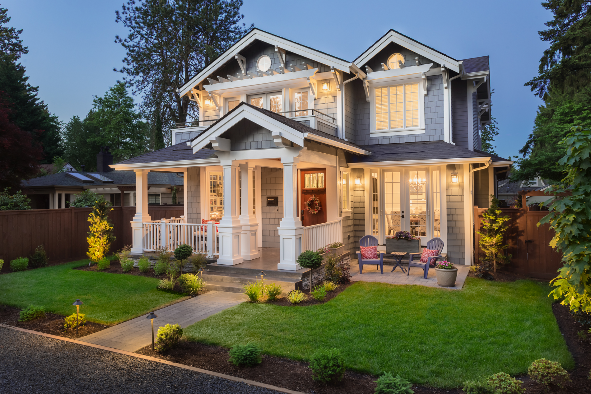 Outside view of a residential house that has all lights working properly.