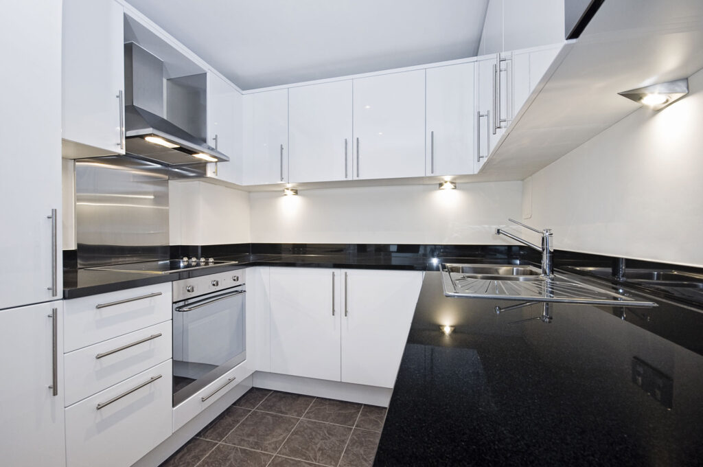 Residential kitchen with newly installed lights.